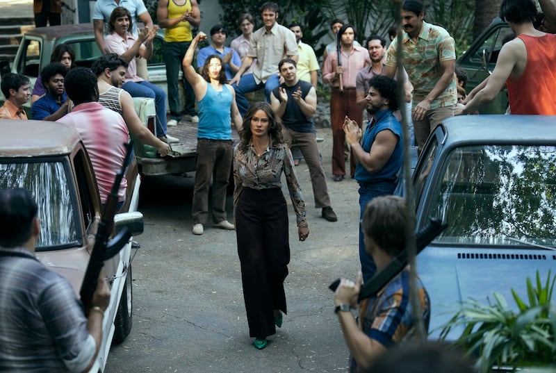 Sofia Vergara walks down the street in a still from ‘Griselda’