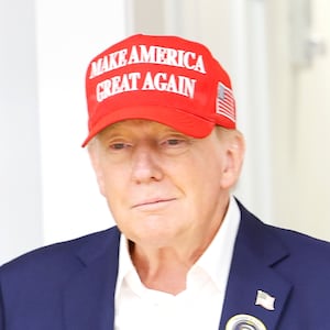 Donald Trump and Melania Trump depart after casting their votes at a polling place in the Morton and Barbara Mandel Recreation Center on Election Day, on November 5, 2024, in Palm Beach, Florida.