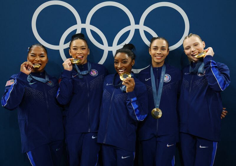 Team USA poses with gold medals