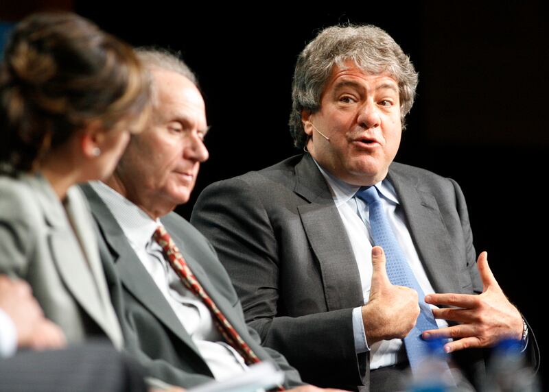 Leon Black (right) speaks at the the 2010 Milken Institute Global Conference in Beverly Hills, California.