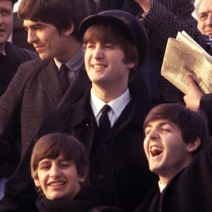 George Harrison, Ringo Starr, John Lennon, and Paul McCartney arriving at JFK airport