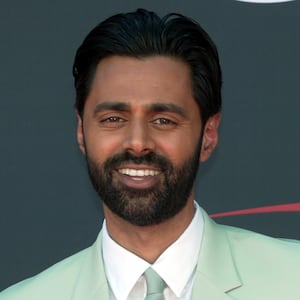 Comedian Hasan Minhaj poses on the red carpet at the 2023 ESPYs.