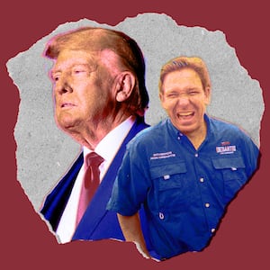 A photo composite of Donald Trump and Ron Desantis on a piece of scrap paper.