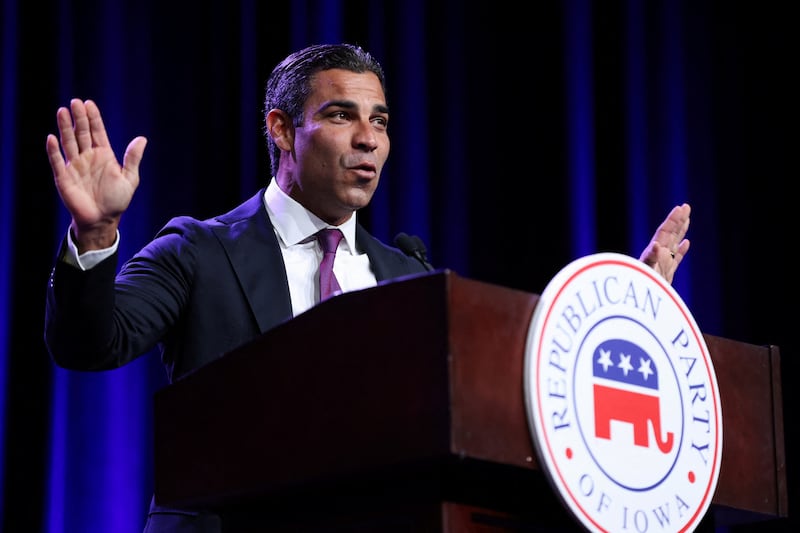 Miami Mayor and Republican presidential candidate Francis Suarez gestures as he speaks at the Republican Party of Iowa's Lincoln Day Dinner in Des Moines, Iowa