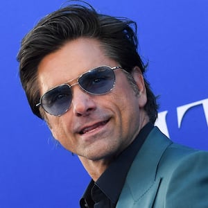 John Stamos at the world premiere of "The Little Mermaid"