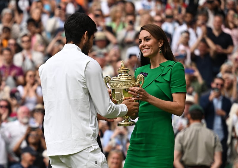 Kate Middleton presents the Wimbledon men's championship trophy to Spain's Carlos Alcaraz in 2023.