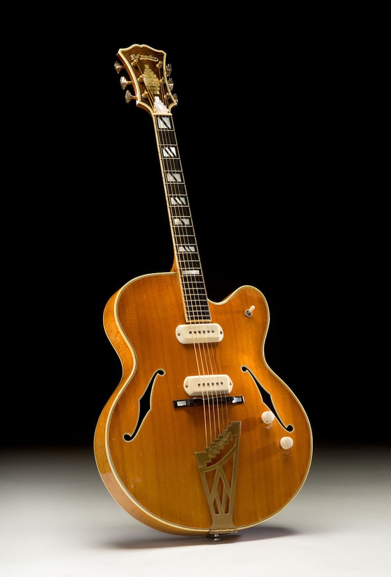 galleries/2014/04/01/a-collection-of-250-remarkable-acoustic-guitars-goes-on-the-auction-block-photos/acoustic-guitar-auction-1955-dangelico_uq1huj