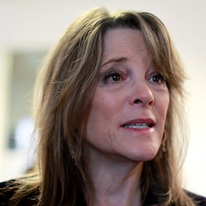 Marianne Williamson talks with child care advocates at the Nevada State Legislature in Carson City, Nevada, March 14, 2019.  