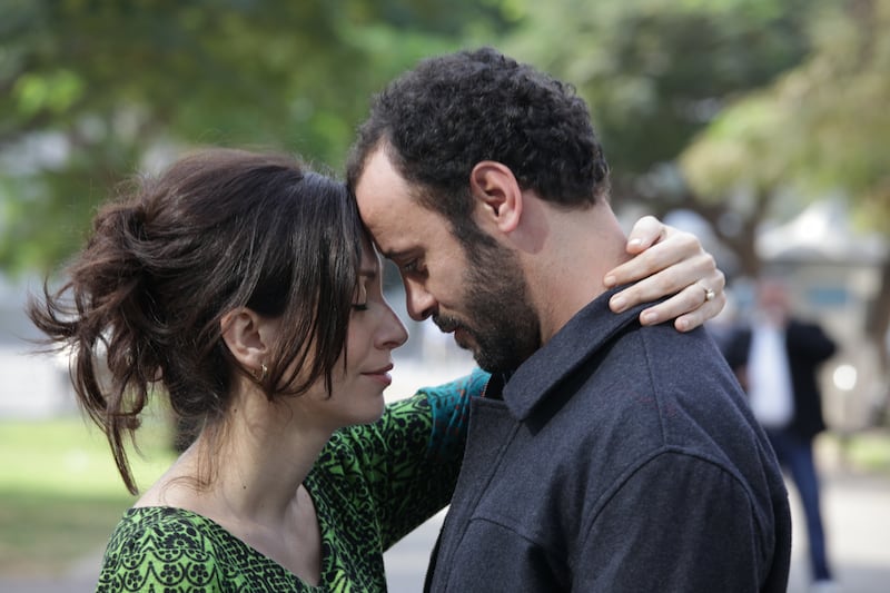 articles/2013/06/20/the-attack-filmmaker-boycotted-for-filming-in-israel/Siham-and-Amin-Embrace_mq6sh3