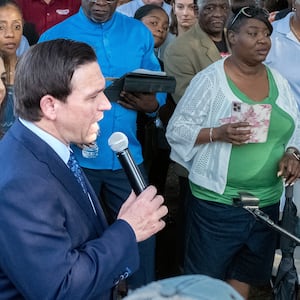 Florida Gov. Ron DeSantis speaks at a prayer vigil a day after a mass shooting in Jacksonville.