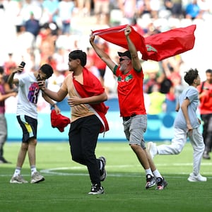 Morocco fans invading the pitch