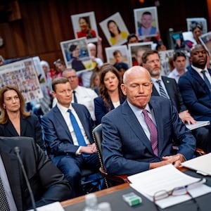 Photograph of Boeing CEO Dave Calhoun testifying before Congress.