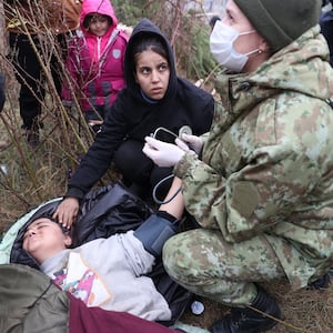 2021-11-11T171506Z_53302887_RC2GSQ9SIQ1R_RTRMADP_3_EUROPE-MIGRANTS-BELARUS-POLAND_wgalye