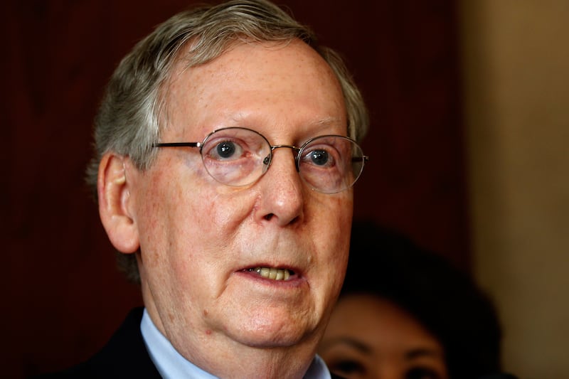 articles/2014/05/19/mitch-mcconnell-sends-tea-party-a-message-don-t-get-in-my-way/140519-youngman-mcconnell-tease_np4mjl