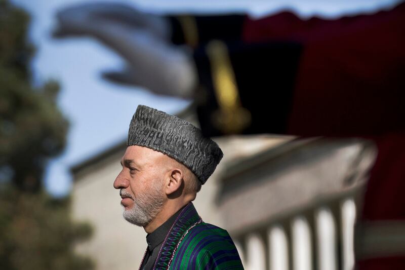 articles/2012/12/08/afghanistan-the-taliban-plot-to-assassinate-karzai/yousafzai-karzai-kill-plot-tease-embed_ckdexz