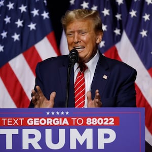 Former President Donald Trump addresses a campaign rally at the Forum River Center.