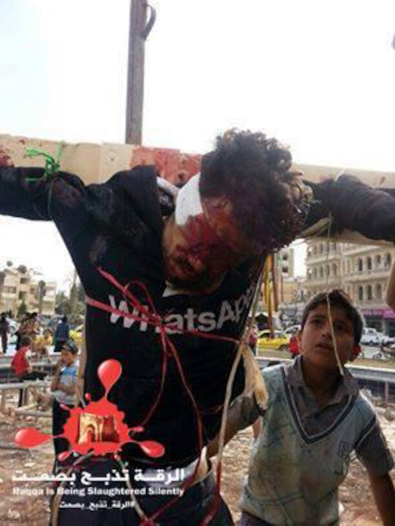 articles/2014/04/30/islamic-extremists-now-crucifying-people-in-syria-and-tweeting-out-the-pictures/140429-siegel-crucifixtion-embed_rms3me