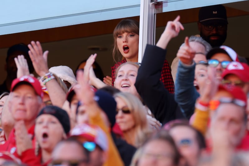 KANSAS CITY, MISSOURI - NOVEMBER 10: Taylor Swift reacts while watching the first half of game between the Kansas City Chiefs and the Denver Broncos at GEHA Field at Arrowhead Stadium on November 10, 2024 in Kansas City, Missouri. (Photo by Jamie Squire/Getty Images)