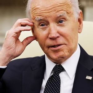 Joe Biden scratches his head in an interview.