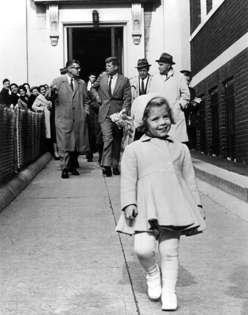 galleries/2013/07/26/caroline-kennedy-through-the-years-photos/caroline-walking-jfk_j2m4kn