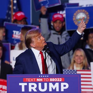 Republican presidential candidate and former U.S. President Donald Trump gestures during a rally in Durham, New Hampshire