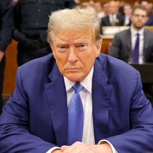 Former U.S. President Donald Trump sits in the courtroom during his hush money trial at Manhattan Criminal Court