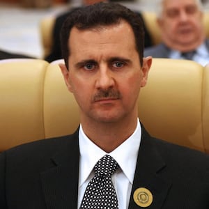 191016-hodge-assad-trump-hero_mk5314