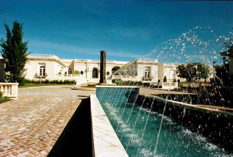 View of the fountains and a sculpture on the grounds of the Maison de l'Amitie