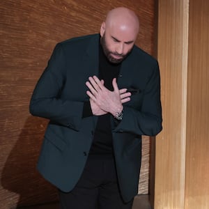 Actor John Travolta speaks at the start of the In Memoriam segment of the Oscars show at the 95th Academy Awards in Hollywood.