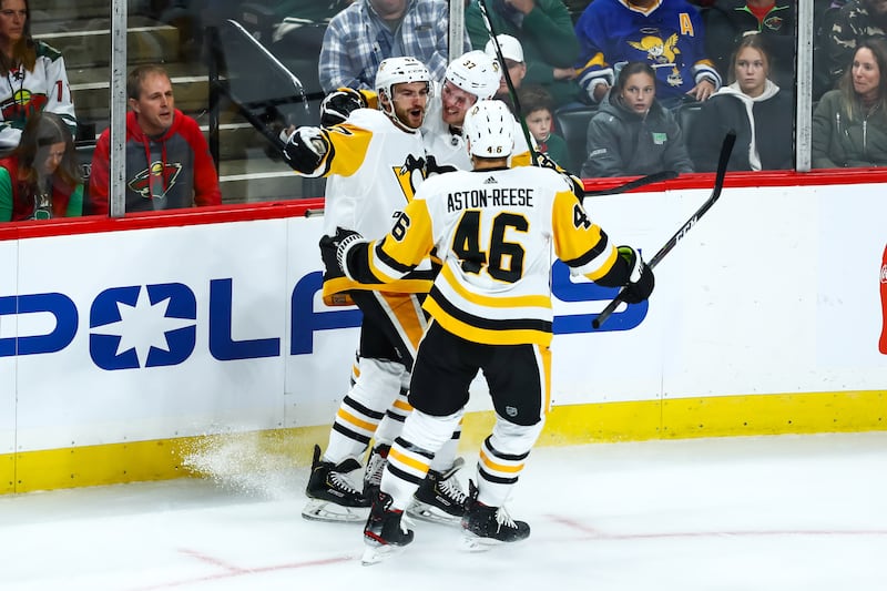 Adam Johnson celebrates after scoring his first career NHL goal.