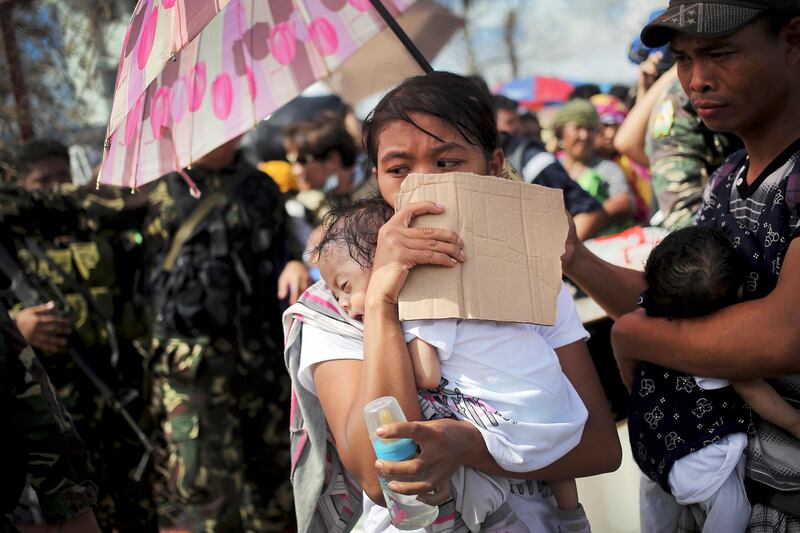 articles/2013/11/14/typhoon-haiyan-tacloban-leaders-calls-on-rebels-to-avoid-armed-violence/131114-telegraph-tacloban_rwreo1