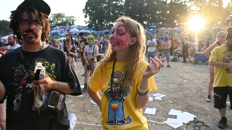 Two fans pose together at the 2023 Gathering of the Juggalos