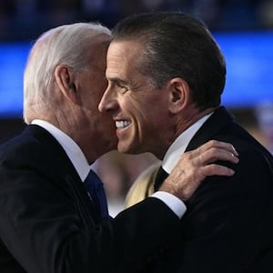 President Joe Biden and his son Hunter Biden hug on stage at the Democratic National Convention.