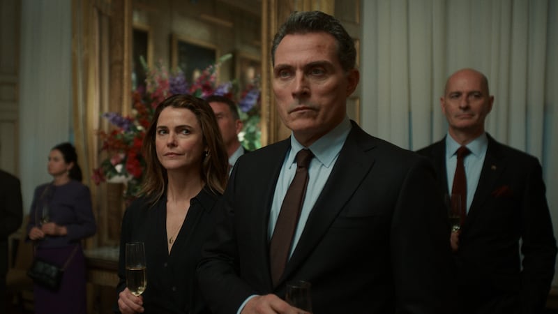 Keri Russell as Kate Wyler, Rufus Sewell as Hal Wyler