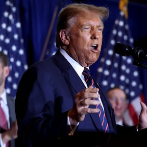 Republican presidential candidate and former U.S. President Donald Trump speaks during his New Hampshire presidential primary election night watch party, in Nashua, New Hampshire, U.S., January 23, 2024. 