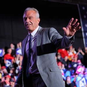 Robert F. Kennedy Jr. waves during Republican presidential nominee and former U.S. President Donald Trump's campaign rally at Macomb Community College in Warren, Michigan, U.S., November 1, 2024.