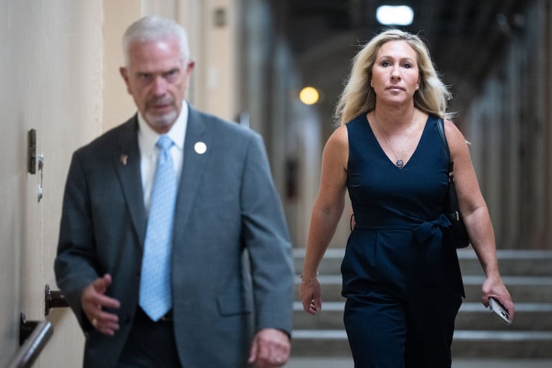 A photo of Rep. Bill Johnson, the incoming Youngstown State University president, seen with Rep. Marjorie Taylor Greene at the Capitol in June for a House Republican Conference caucus meeting. 