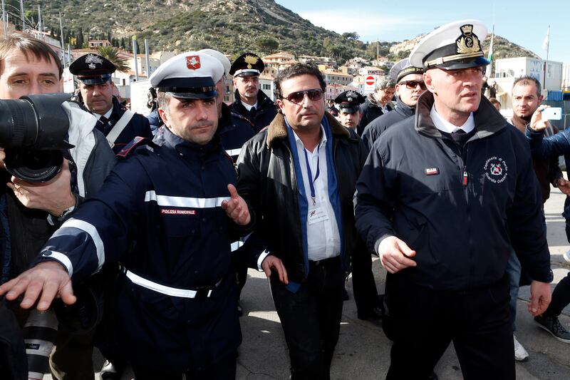 articles/2014/02/27/captain-schettino-returns-to-costa-concordia-crime-scene/140227-schettino-back-on-board-tease_h9q62f