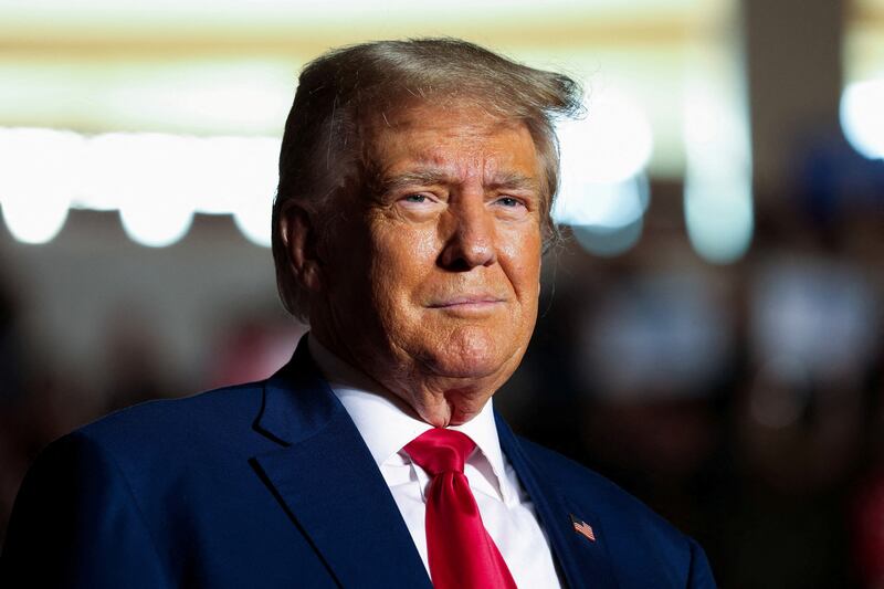 Former U.S. President and Republican presidential candidate Donald Trump looks on as he holds a campaign rally in Erie, Pennsylvania