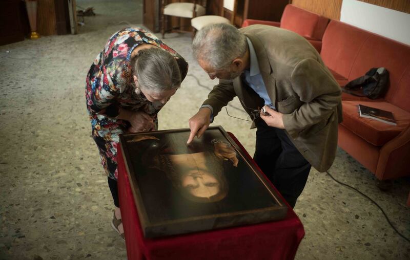 Dianne_Modestini_and_Ashok_Roy_inspecting_the_Naples_copy_of_the_Salvator_Mundi_2019_._Copyright_THE_LOST_LEONARDO_-_Photo_by_Adam_Jandrup_-_Couresty_of_Sony_Pictures_Classics_h4vuve