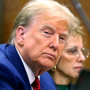 Former president Donald Trump appears with his lawyer Susan Necheles for a pre-trial hearing in a hush money case