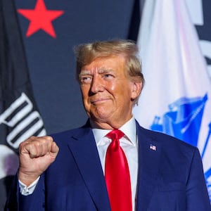 Former U.S. President and Republican presidential candidate Donald Trump greets the crowd during a campaign rally in Windham, New Hampshire, U.S., August 8, 2023.