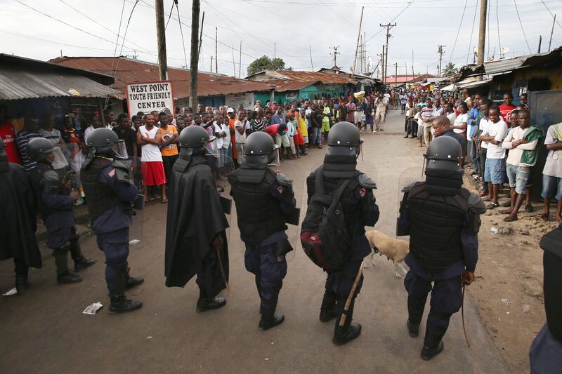 galleries/2014/08/21/violence-and-chaos-ensue-as-panic-spreads-in-liberia-photos/140821-ebola-liberia-12_yzxhps