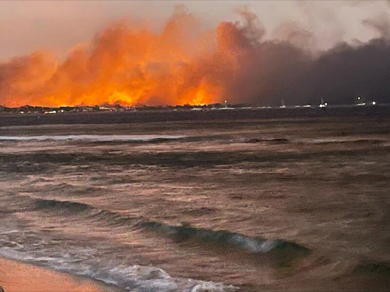 Flames engulf the historic town of Lahaina.