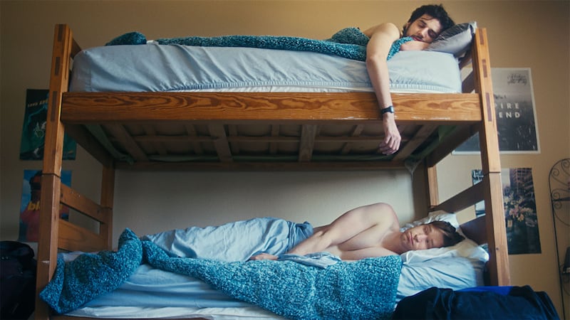 Jacob Roberts and Bren Treviño sleep in bunk beds in ‘Rent Free.’