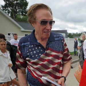 "U.S. Republican presidential candidate businessman Perry Johnson waits for the start of the Fourth of July Parade in Merrimack, New Hampshire, U.S.