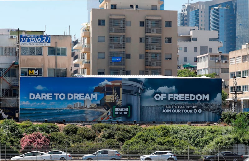 An anti-occupation billboard, by Israeli NGO Breaking The Silence.