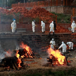 2021-05-05T063456Z_516620247_RC2I9N9IPMGF_RTRMADP_3_HEALTH-CORONAVIRUS-NEPAL_ydlsaj