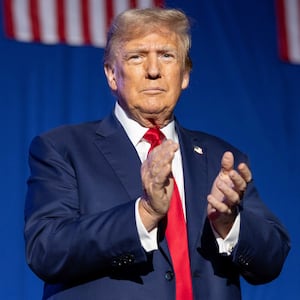 Republican presidential candidate, former President Donald Trump arrives at a campaign event at the Whittemore Center Arena in Durham, New Hampshire. 