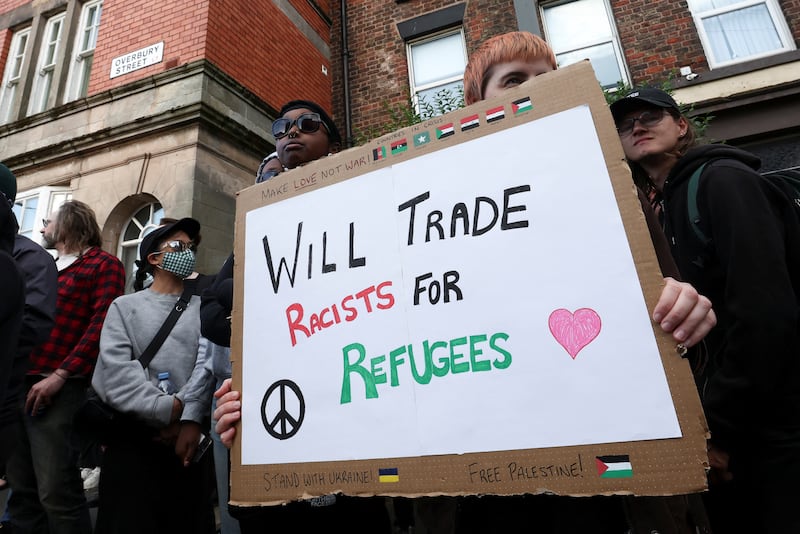 People gather against an an anti-immigration protest, in Liverpool , Britain, August 7, 2024.